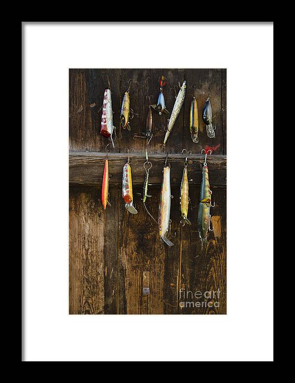Stockholm Framed Print featuring the photograph Fishing Lure Hanging On Wall Sandham by Bmj