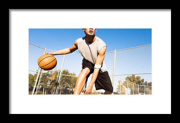 College Framed Print featuring the photograph Fit Male Playing Basketball Outdoor by Pkpix