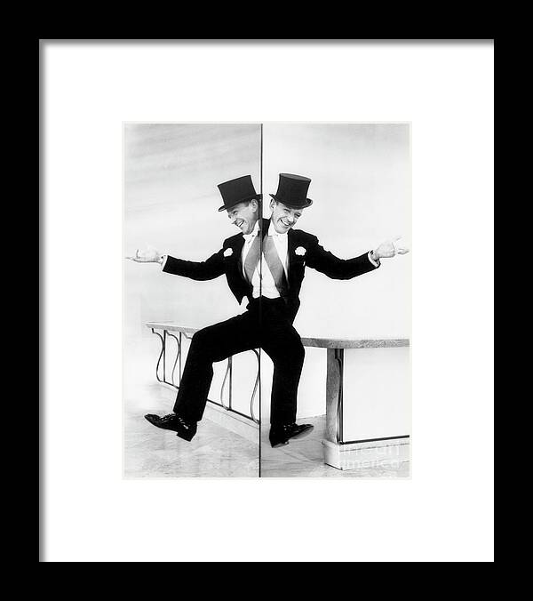 Mature Adult Framed Print featuring the photograph Fred Astaire Dancing Along Mirror by Bettmann