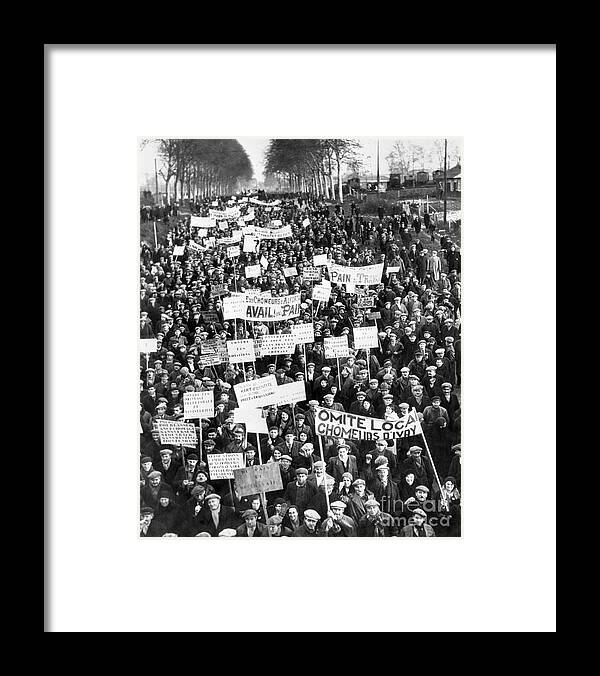 Marching Framed Print featuring the photograph French Hunger Marchers With Signs by Bettmann