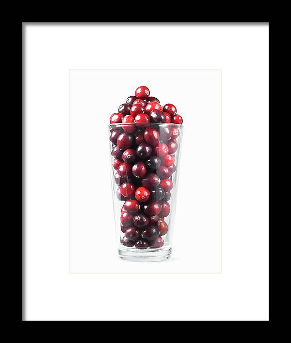 White Background Framed Print featuring the photograph Fresh Cranberries In Drinking Glass by Lauren Nicole