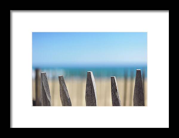In A Row Framed Print featuring the photograph Ganivelles At Ste Maxime Beach, Golfe by Alexandre Fp