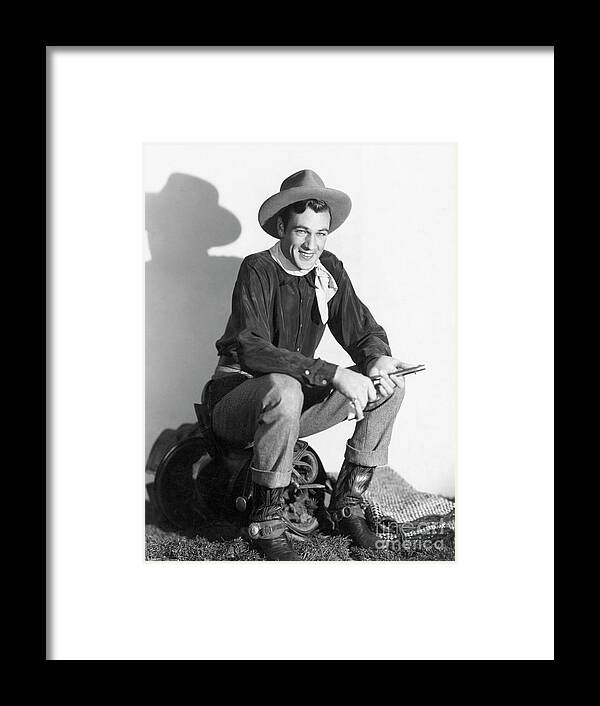 People Framed Print featuring the photograph Gary Cooper In Costume For The Texan by Bettmann