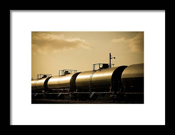 Natural Gas Framed Print featuring the photograph Gasoline Train At Sunset by Halbergman