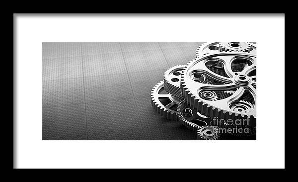 Gears Framed Print featuring the photograph Gears and cogs mechanism. Industrial machinery by Michal Bednarek