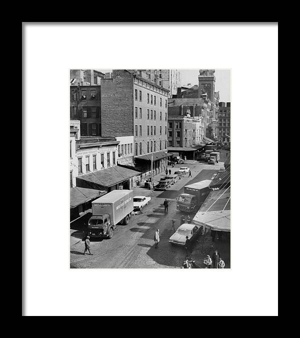 General View Framed Print featuring the photograph General View Of Moving Vans Loading Up by New York Daily News Archive