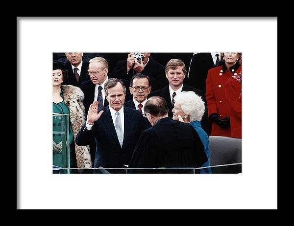 President Bush Framed Print featuring the photograph George Bush Sr. Taking Oath - 1989 by War Is Hell Store