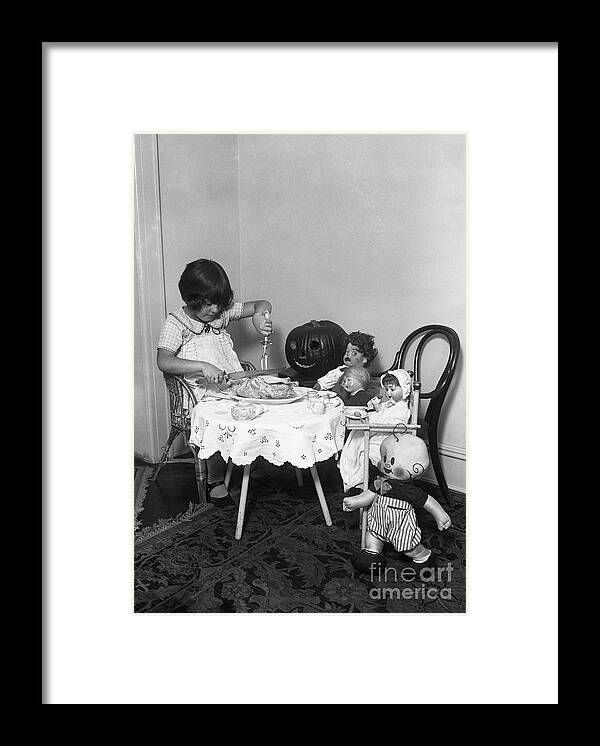 Child Framed Print featuring the photograph Girl 6-7 Dining With Her Dolls And Toys by Bettmann