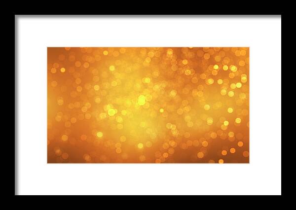 Particle Framed Print featuring the photograph Gold Sparks by Brainmaster