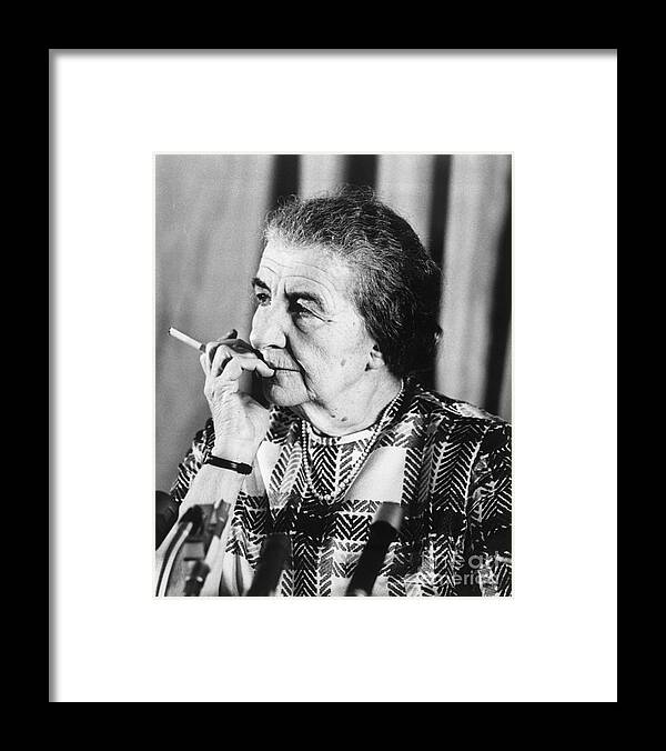 People Framed Print featuring the photograph Golda Meir Smoking A Cigarette by Bettmann