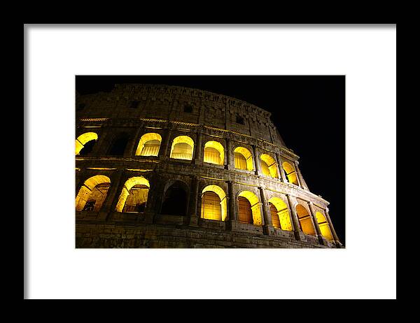 Colosseum At Night Framed Print featuring the photograph Golden glow by Patricia Caron