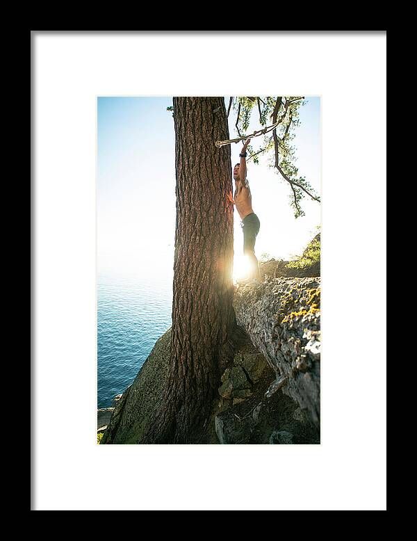Summer Framed Print featuring the photograph Grabbing For Rope Swing In Summer On Lake Tahoe by Cavan Images