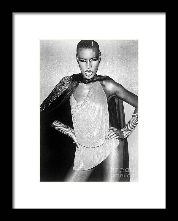 People Framed Print featuring the photograph Grace Jones In Provocative Outfit by Bettmann