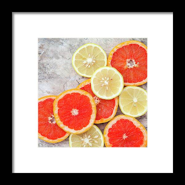 Rosario Framed Print featuring the photograph Grapefruit And Lemon by Flavia Morlachetti