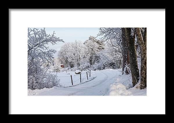 Snowy Gravelled Road Framed Print featuring the photograph Gravelled road in winter by Torbjorn Swenelius