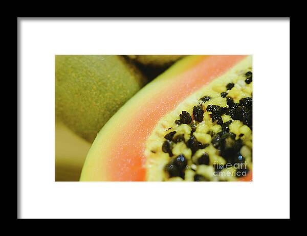 Background Framed Print featuring the photograph Group of fruits papaya, grape, kiwi and bananas by Joaquin Corbalan