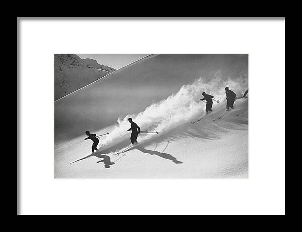 Skiing Framed Print featuring the photograph Group Of Skiers Descending Alpine by H. Armstrong Roberts