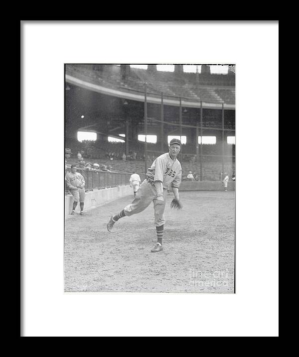 People Framed Print featuring the photograph Grover Cleveland Alexander Throwing by Bettmann