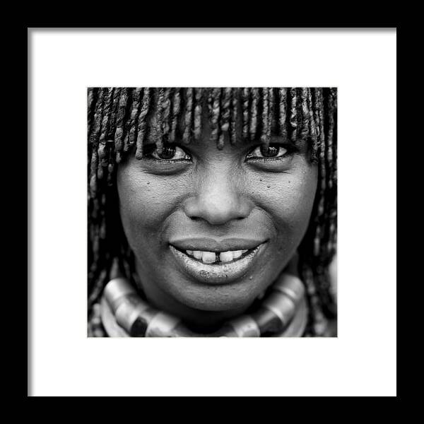 Child Framed Print featuring the photograph Hamar Tribe Woman In Ethiopia On by Eric Lafforgue