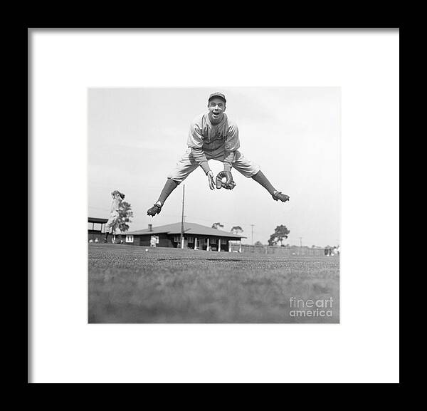 People Framed Print featuring the photograph Harold Peewee Reese Practicing In Action by Bettmann