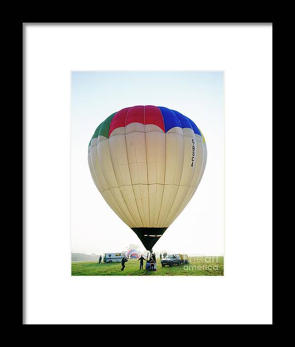 Person Framed Print featuring the photograph Hot Air Balloon Launch by Steve Allen/science Photo Library