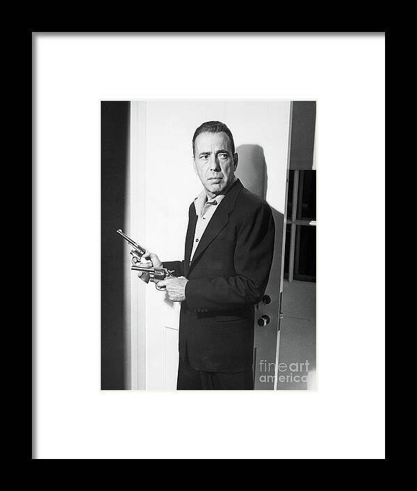 Releasing Framed Print featuring the photograph Humphrey Bogart In Movie Still by Bettmann