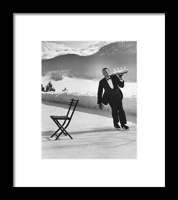 Ice Skating Framed Print featuring the photograph Ice Skating Waiter by Alfred Eisenstaedt
