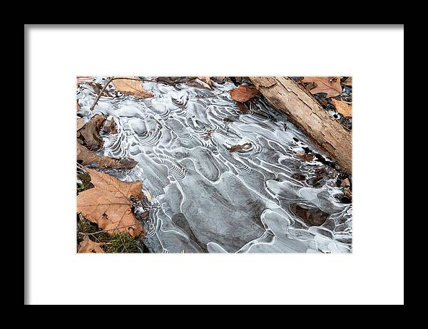 Ice Framed Print featuring the photograph Ice Swirls by Jeff Severson
