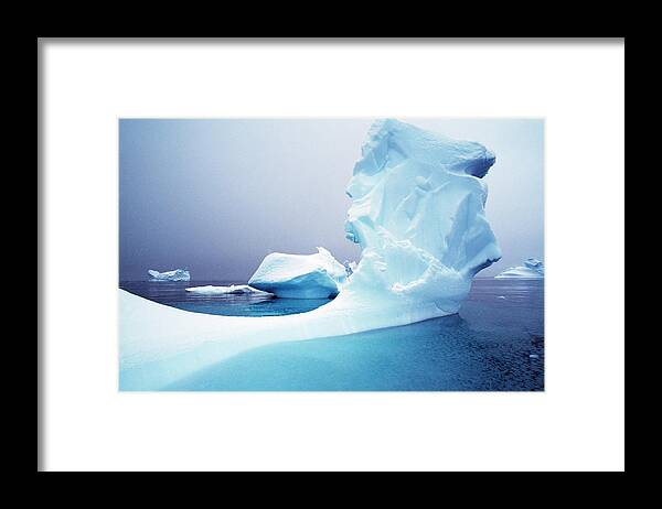 Scenics Framed Print featuring the photograph Icebergs Floating On Antarctic Peninsula by Alexander Nicholson