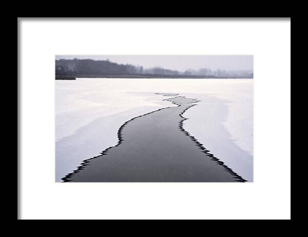Yahara River Freeze Frozen Winter Snow Abstract Path Infinity Converging B&w Black And White Jagged Framed Print featuring the photograph Icy Battle - Last remnant of unfrozen Yahara River in Stoughton WI by Peter Herman