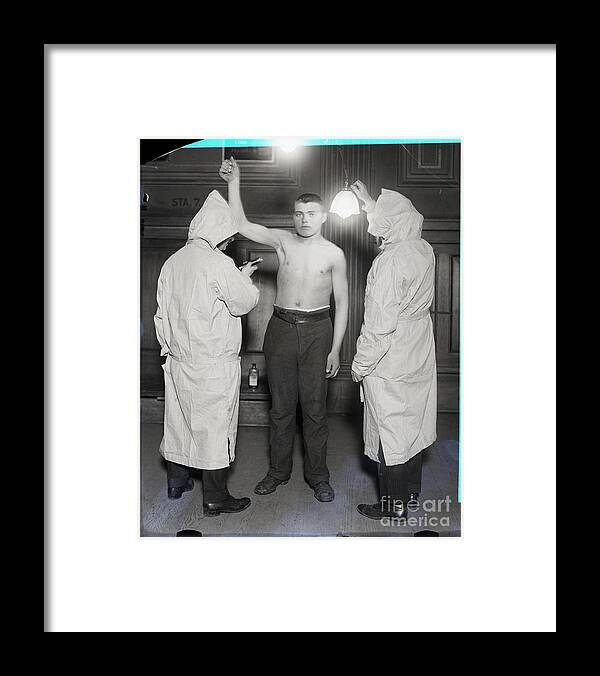 People Framed Print featuring the photograph Immigrant Being Examined By Health by Bettmann