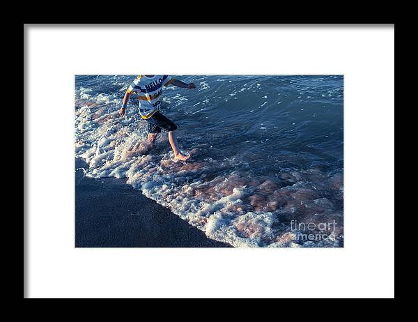 Active Framed Print featuring the photograph In summer children have to exercise outdoors and go out to sea t by Joaquin Corbalan
