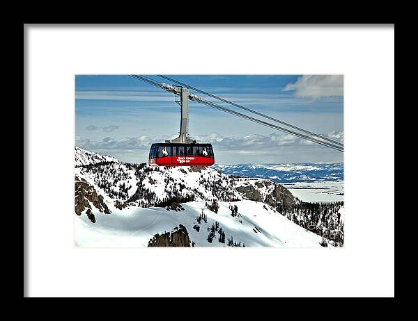 Jackson Hole Tram Framed Print featuring the photograph Jackson Hole Aerial Tram Over The Snow Caps by Adam Jewell