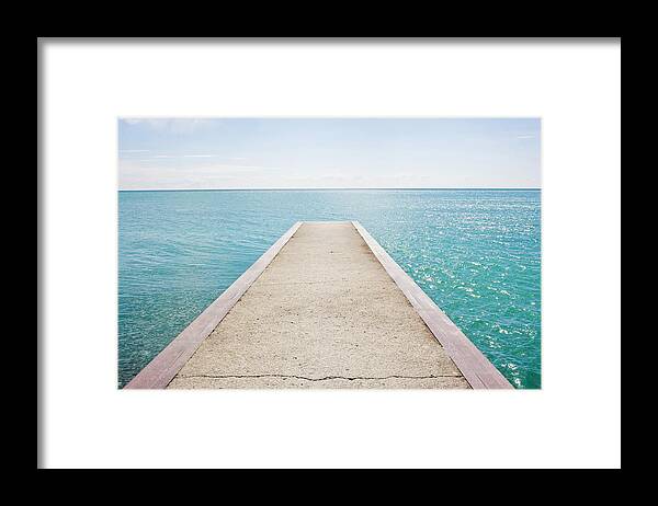 Water's Edge Framed Print featuring the photograph Jetty by Michellegibson
