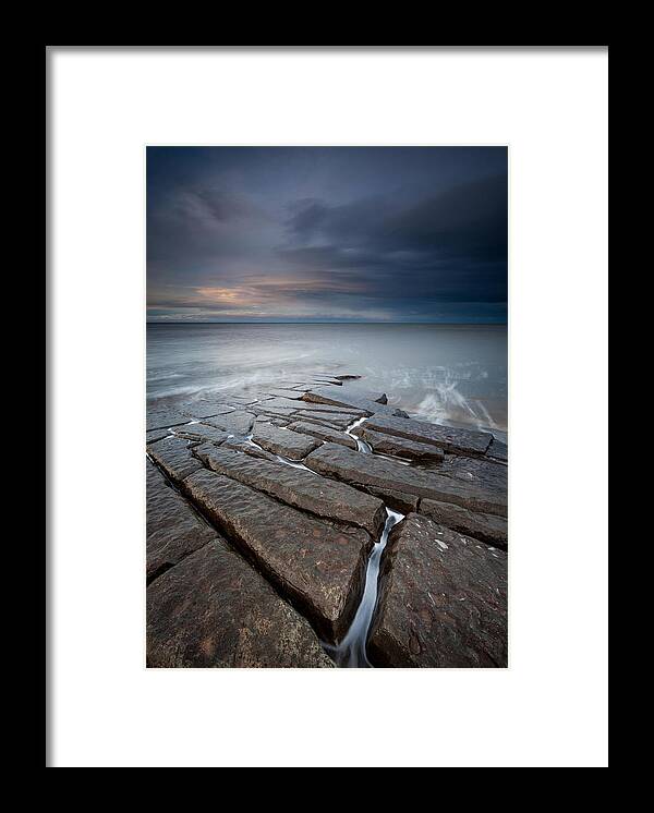 Oceans Framed Print featuring the photograph Jigsaw Puzzle Like Slabs Of Angular by Anita Nicholson