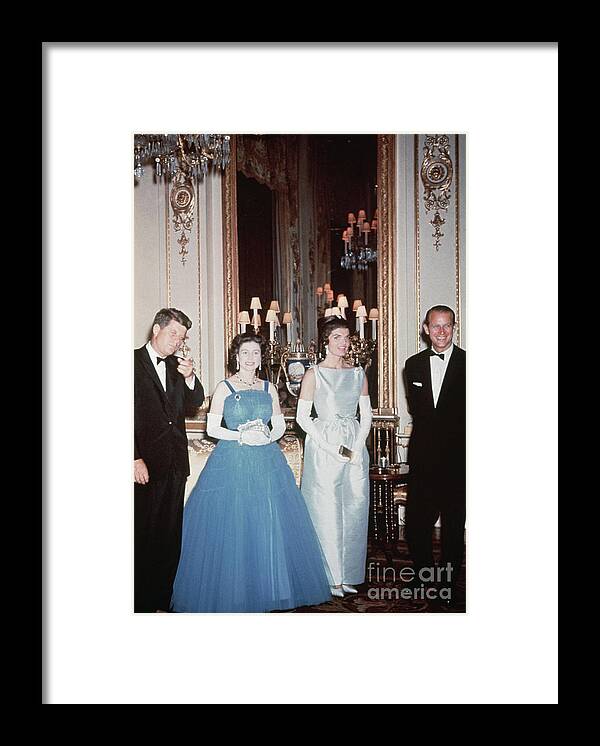 People Framed Print featuring the photograph John F. Kennedy And Queen Elizabeth II by Bettmann