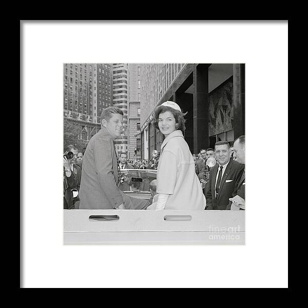People Framed Print featuring the photograph John F. Kennedy And Wife In Limousine by Bettmann