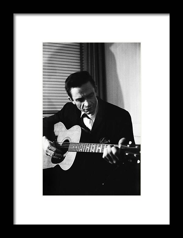 Johnny Cash Framed Print featuring the photograph Johnny Cash At The New York Folk by Michael Ochs Archives