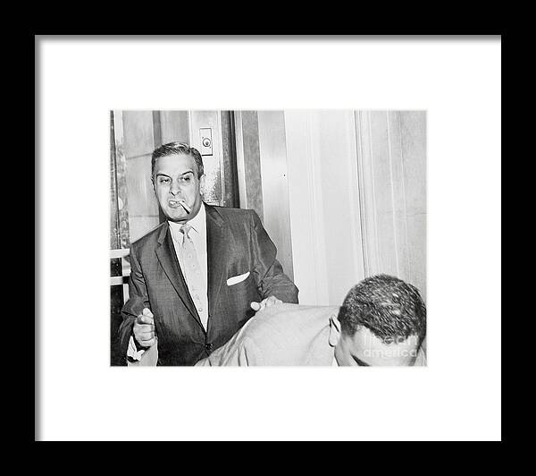 People Framed Print featuring the photograph Johnny Dio Punching Journalist Stanley by Bettmann