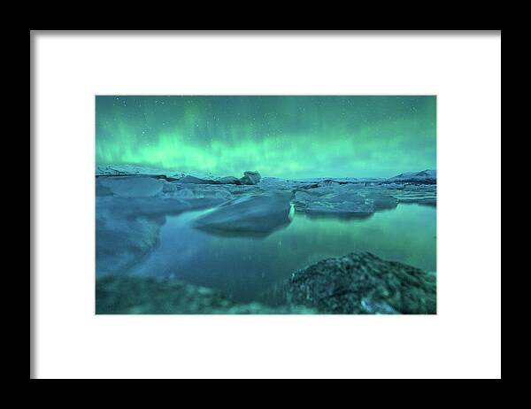 Scenics Framed Print featuring the photograph Jokusarlon Glacial Lake With Aurora by Coolbiere Photograph