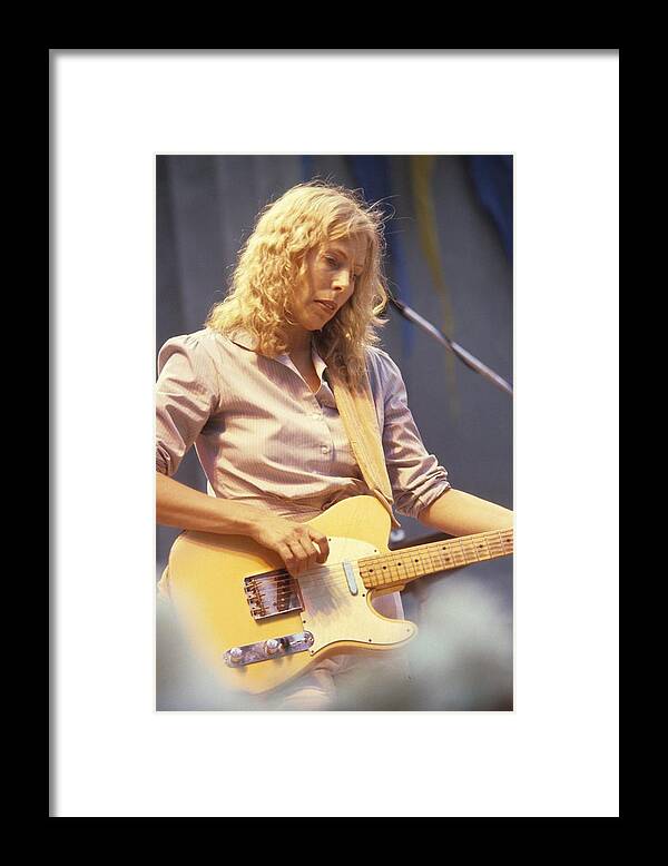People Framed Print featuring the photograph Joni Mitchell Performs Live by Richard Mccaffrey