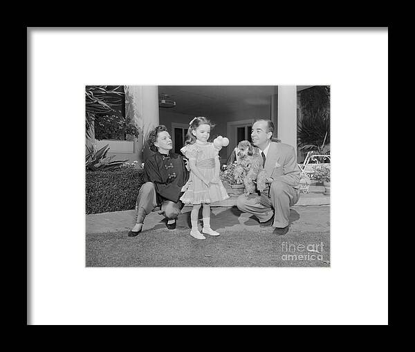 Singer Framed Print featuring the photograph Judy Garland With Husband And Daughter by Bettmann