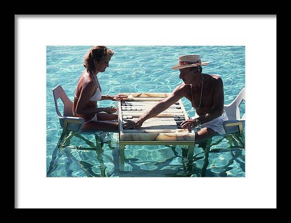 Straw Hat Framed Print featuring the photograph Keep Your Cool by Slim Aarons