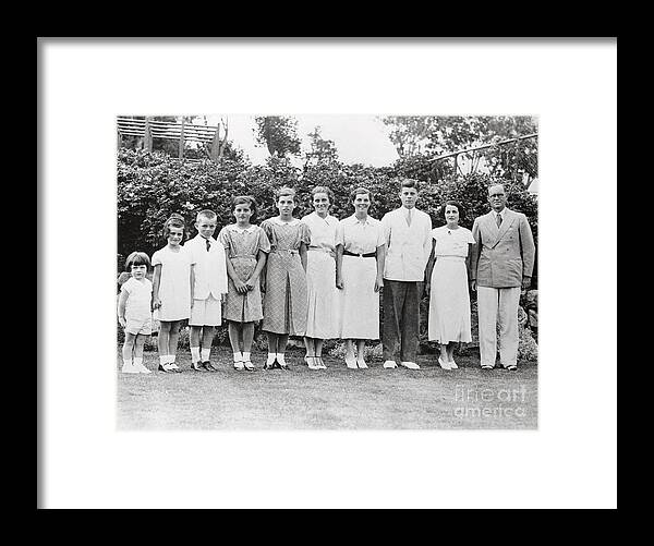 Mature Adult Framed Print featuring the photograph Kennedy Family Standing On Lawn by Bettmann