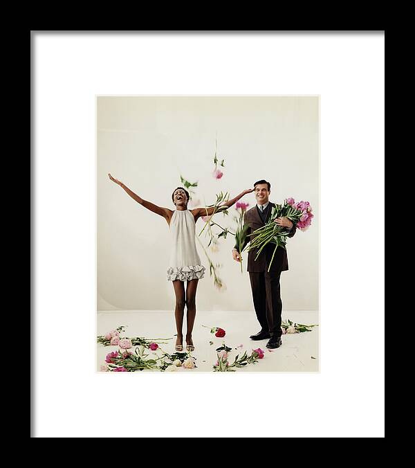 #new2022vogue Framed Print featuring the photograph Kiara Kabukuru Showered In Flowers by Arthur Elgort