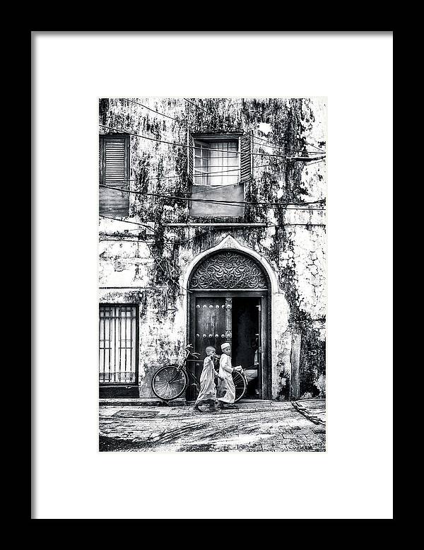 10-15 Years Framed Print featuring the photograph Kids walking - Stonetown Zanzibar 3620 by Neptune - Amyn Nasser Photographer