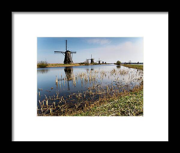 Environmental Conservation Framed Print featuring the photograph Kinderdijk Mills by Peterj©