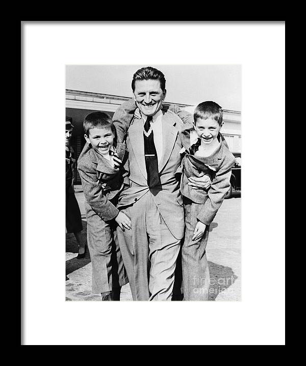 Child Framed Print featuring the photograph Kirk Douglas And Sons Michael And Joel by Bettmann