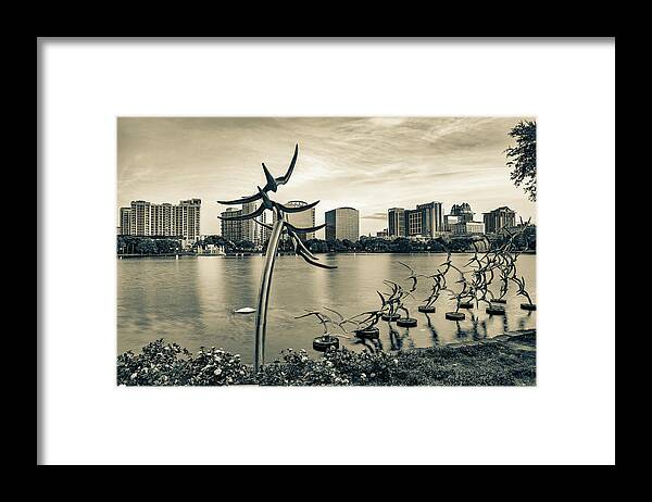 America Framed Print featuring the photograph Lake Eola Park Orlando Skyline Sunset in Sepia by Gregory Ballos