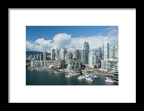 Water's Edge Framed Print featuring the photograph Landscape Of City Vancouver In Canada by Deejpilot